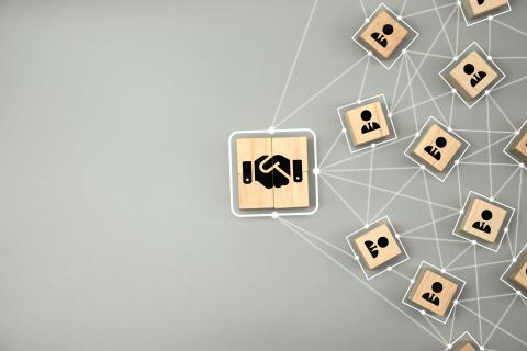 https://www.istockphoto.com/photo/hand-shake-icon-on-wooden-cube-block-which-connection-with-human-icon-for-business-gm1730010417-541682799?searchscope=image%2Cfilm